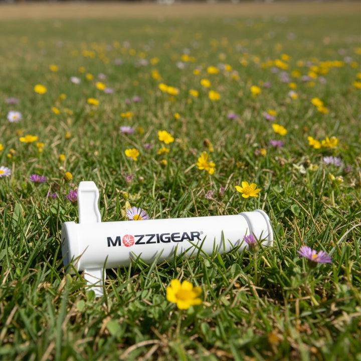 Mozzigear The Sucker displayed in a flower garden, showing its natural, non-toxic bite relief design for sensitive skin.